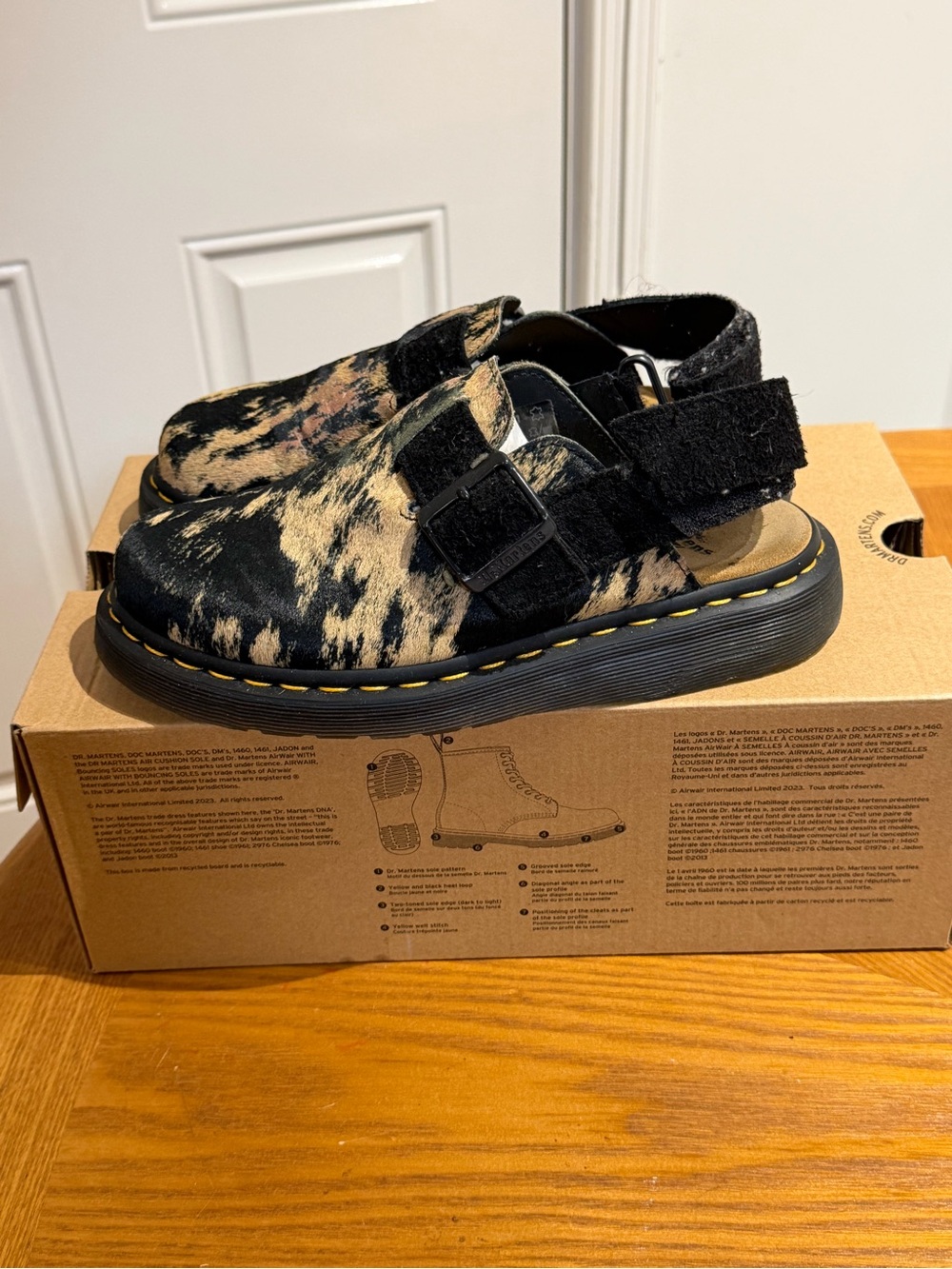 Dr. Martens Kids Black and Cream Patterned Fur Slingback Clogs